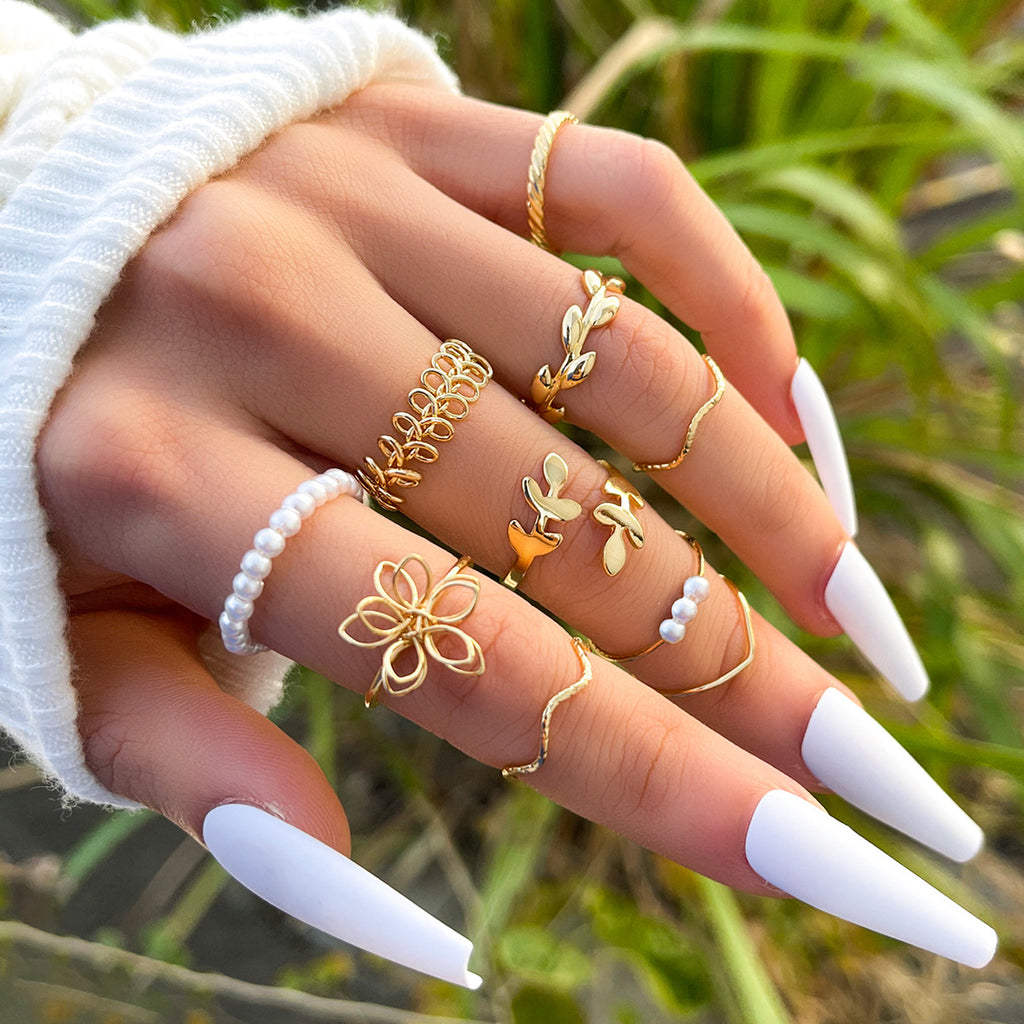 Simple glossy openwork flower statement ring
