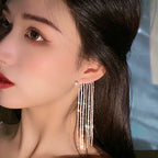 Long gold-plated tassel drop earrings