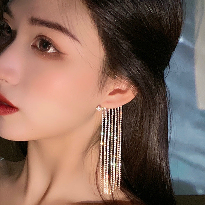Long gold-plated tassel drop earrings